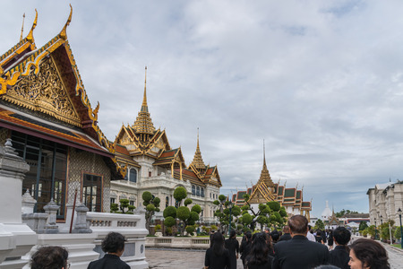 Bangkok, Thailand - August 25, 2017 : Unidentified Thai mourners wearing black color waiting in The Grand Palace to pay tribute and respect to their beloved Rama 9 Thai King Bhumibol Adulyadejのeditorial素材