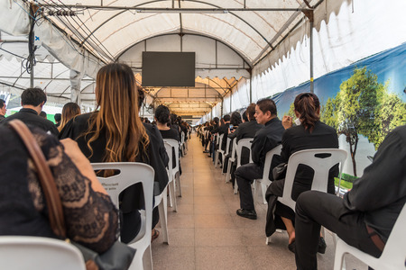 Bangkok, Thailand - August 25, 2017 : Unidentified Thai mourners wearing black color waiting in The Grand Palace to pay tribute and respect to their beloved Rama 9 Thai King Bhumibol Adulyadejのeditorial素材