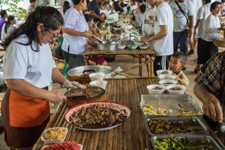 Bangkok, Thailand - July 8, 2017 : Unidentified people shopping at Thai street food market vintage...