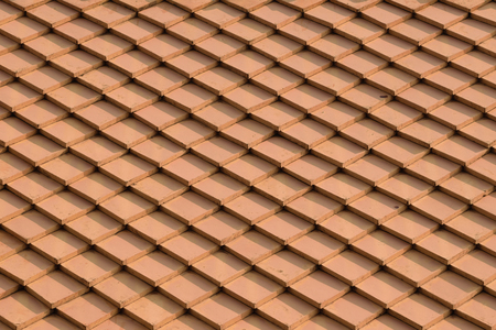 Tile roof of old Thai temple texture surface natural color use for background