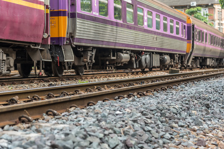 Bangkok, Thailand - July 12, 2017 : Unidentified railway train on the railroad tracks in Bangkok station. Many people in Thailand popular travel by train because it is cheaper.のeditorial素材