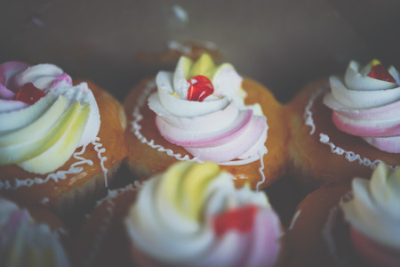 Cake vintage Thai style topped with sugar, cream and jam is a ancient dessert tasty sweet at Thai street food market or dessert restaurantの写真素材