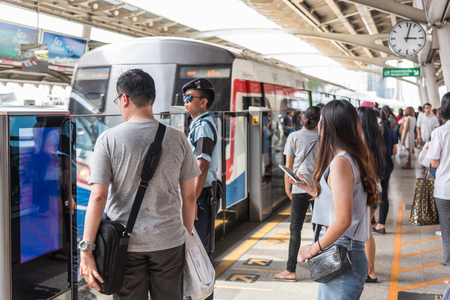 Bangkok, Thailand - June 4, 2017 : BTS skytrain train runs in Bangkok. Many people in Bangkok used skytrain to save time.のeditorial素材
