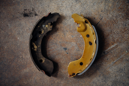Drum brake and asbestos brake pads it's a part of car use for stop the car for safety at rear wheel...