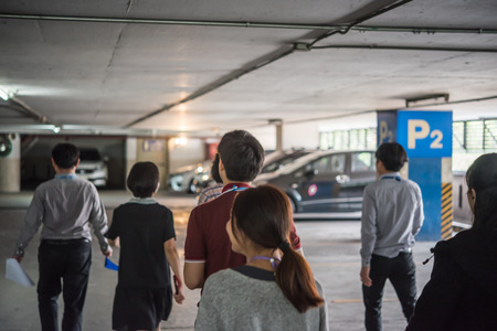 Bangkok, Thailand - November 30, 2017 : Many working people preparedness for fire drill or other disaster at office in Bangkok Thailandのeditorial素材