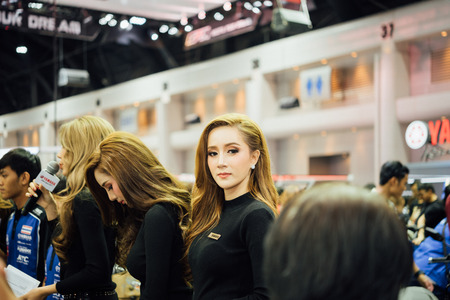 Bangkok, Thailand - December 10, 2017 : Unidentified model pretty lady on display in car show event. This a open event no need press credentials required.のeditorial素材
