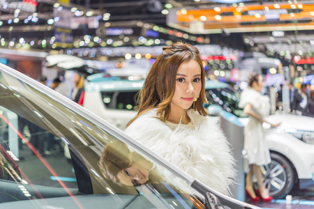 Bangkok, Thailand - December 10, 2017 : Unidentified model pretty lady on display in car show event. This a open event no need press credentials required.のeditorial素材