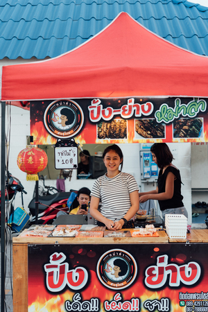 Bangkok, Thailand -  April 26, 2018 : Unidentified chef cooking a Mala is Grilled meat (Beef, Pork, Chickens or Mushroom) with chilli sauce and sichuan pepper for sale at street food market.のeditorial素材