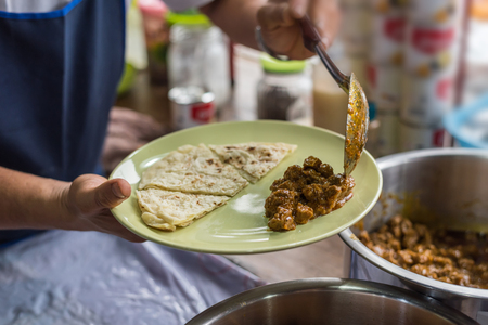 Hangle Curry, Northern Style Hang Lay Curry (Gaaeng Hang Laeh) with Roti, Chapatti, Nan or Naan for sale at Thai street food market or restaurant in Thailandの写真素材
