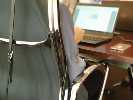 Asian business woman discussion with team and work by laptop or computer notebook in meeting room at her corporate officeの写真素材