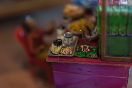 PathumThani, Thailand - August 5, 2017 : Asian clay doll and wooden market store model with ancient lifestyle model at Zeer Rangsit. This a open event no need press credentials required.のeditorial素材