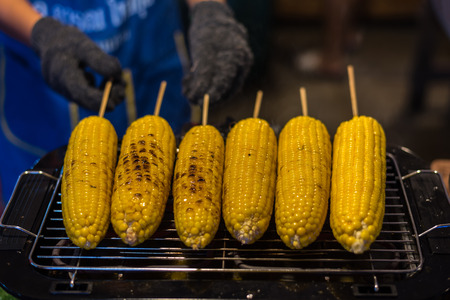 Roasted or Grilled Corn for sale at Thai street food market or restaurant in Thailand