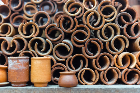 Earthenware make from soil and clay (terracotta) is asian vintage craft in asia for make pot, bowl and other containerの写真素材