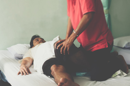 Thai woman to take of service Thai traditional massage for treat aches and pains.の写真素材