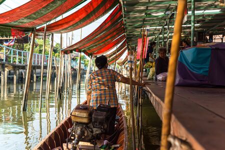 Nonthaburi , Thailand - March 11, 2019 : Wat Takien Floating Market every morning boat venders will cramp to Floating Market to sell product from plantations that varies from fruits to vegetables.のeditorial素材