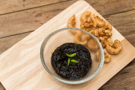 Thai northern Crab Paste Chilli Pepper Sauce consist of Crab water make from Ricefield crabs and...