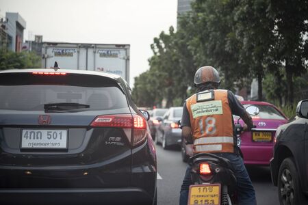 Bangkok, Thailand - September 27, 2019 : Cars on busy road in the Bangkok city, Thailand. Many cars use the street for transportation in rushhour with a traffic jamのeditorial素材