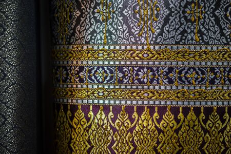 Bangkok, Thailand - December 21, 2019 : Silk fabric Thai and Asian style textured background it a Traditional silk cloth fabric crumpled in for show and sale in traditional fashion storeのeditorial素材