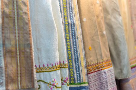 Bangkok, Thailand - December 21, 2019 : Silk fabric Thai and Asian style textured background it a Traditional silk cloth fabric crumpled in for show and sale in traditional fashion storeのeditorial素材