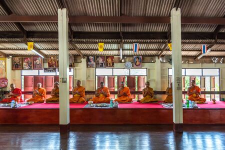Ang Thong, Thailand - October 19, 2019 : Unidentified thai monk praying for religious ceremony in buddhist belief at Thai temple (Wat Thai)のeditorial素材