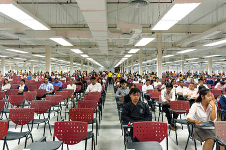 Bangkok, Thailand - July 24, 2016 : Adults take annual exam in big exam room for appoint to work at State Railway of Thailandのeditorial素材