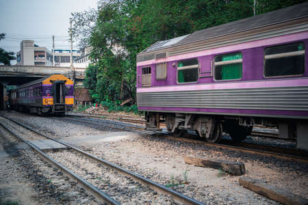 Bangkok, Thailand - January 17, 2020 : Unidentified railway train on the railroad tracks in Bangkok...