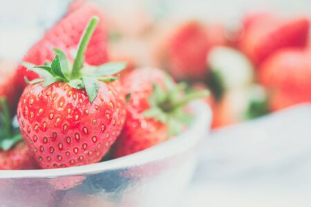 Strawberry is red fresh berry fruit color and sweet juicy for sale at Thai street food and fruit market in concept food and fruit, healthy eating in lifeの写真素材