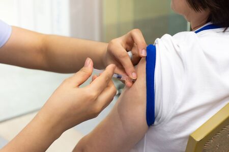 Patient asian woman health check by get vaccinated against the flu covid19 or corona virus every...