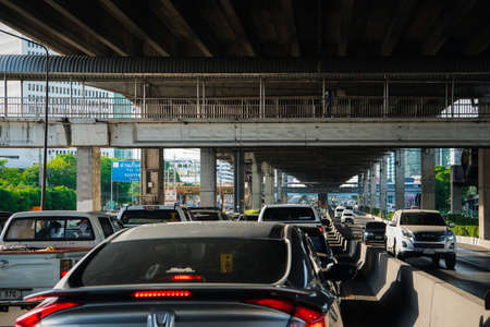 Bangkok, Thailand - June 8, 2020 : Cars on busy road in the Bangkok city, Thailand. Many cars use the street for transportation in rushhour with a traffic jamのeditorial素材