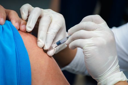 Patient asian woman health check by get vaccinated against the flu covid19 or corona virus every year by the Ministry of Health at hospital in concept illness, outbreak, healthcare in lifeの写真素材