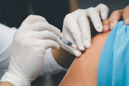 Patient asian woman health check by get vaccinated against the flu covid19 or corona virus every year by the Ministry of Health at hospital in concept illness, outbreak, healthcare in lifeの写真素材