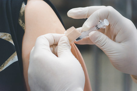 Patient asian woman health check by get vaccinated against the flu covid19 or corona virus every year by the Ministry of Health at hospital in concept illness, outbreak, healthcare in lifeの写真素材