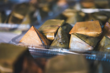 Nian gao is year cake or New Year cake or Chinese New Year's cake, is a sweet food prepared from glutinous rice flour and consumed in Chinese cuisine. It is also simply known as rice cake.の写真素材