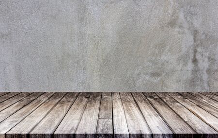 Wall concrete and floors are made of wood. The empty room is used for decorating or displaying...