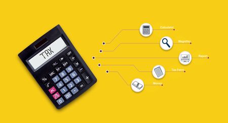 Calculator with tax virtual icon shown on charts and data,  that represents the concept of paying taxes.の写真素材