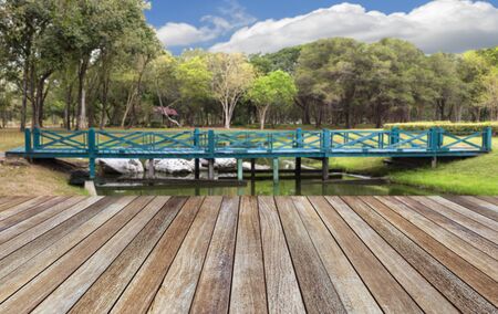 Old wood plank wall texture with tree and bridge for decoration background or backdrop.の写真素材
