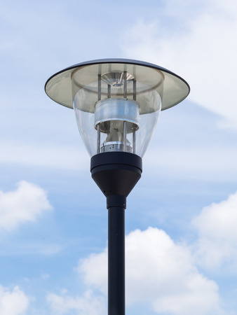light lamp or lantern on blue sky and cloud backgroundの写真素材