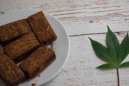 Brownies and cannabis leaf.の写真素材