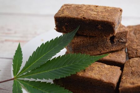 Brownies and cannabis leaf.の写真素材