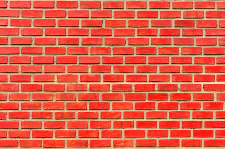 Modern red brick wall seamless background.の写真素材