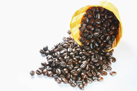 coffee beans on white tableの写真素材