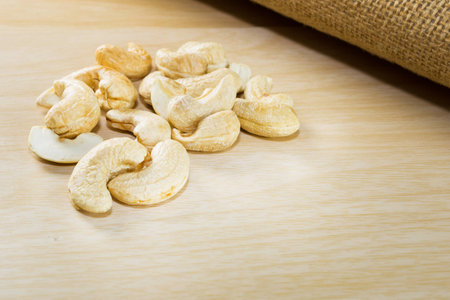 cashew nuts, group of cashew nuts isolated on table.の写真素材