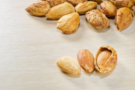group of almonds isolated on table.の写真素材