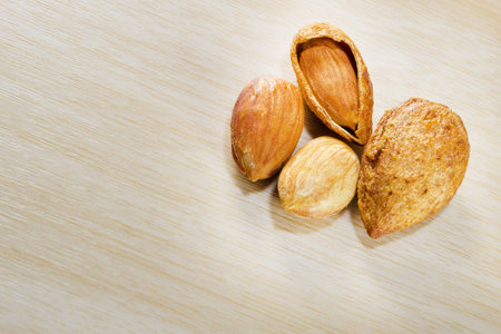 group of almonds isolated on table.の写真素材