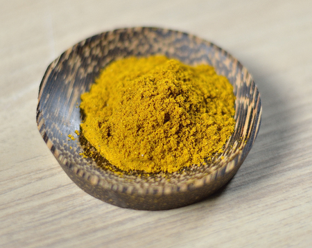 Various spices on wooden tableの写真素材