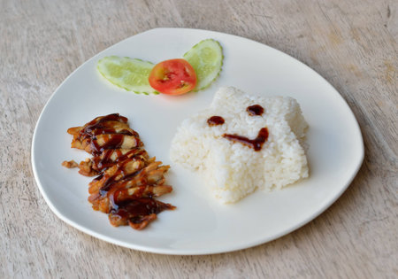 Chicken teriyaki rice with vegetables.の写真素材