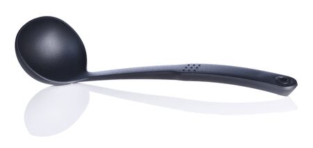 black kitchen ladle isolated on white backgroundの写真素材