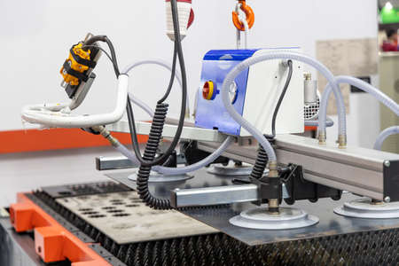 Vacuum hoist lift for transportation material steel plate, Vacuum Lifting Device for Loading a Laser Processing Center.の写真素材