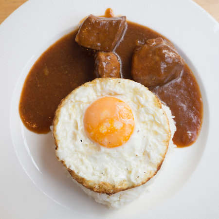 bbq pork and egg with rice (focus egg)
