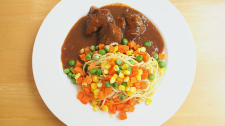 pasta with roasted pork and gravyの写真素材